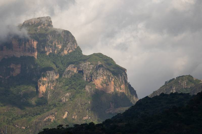 Cliffs of the massif wrapped in cloud