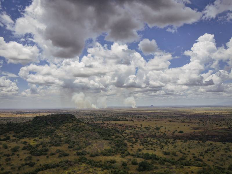 Smoke columns rising from several fires across the reserve